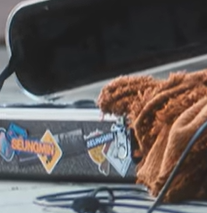 Seungmin stickers on Chan's guitar case in "After You" music video.