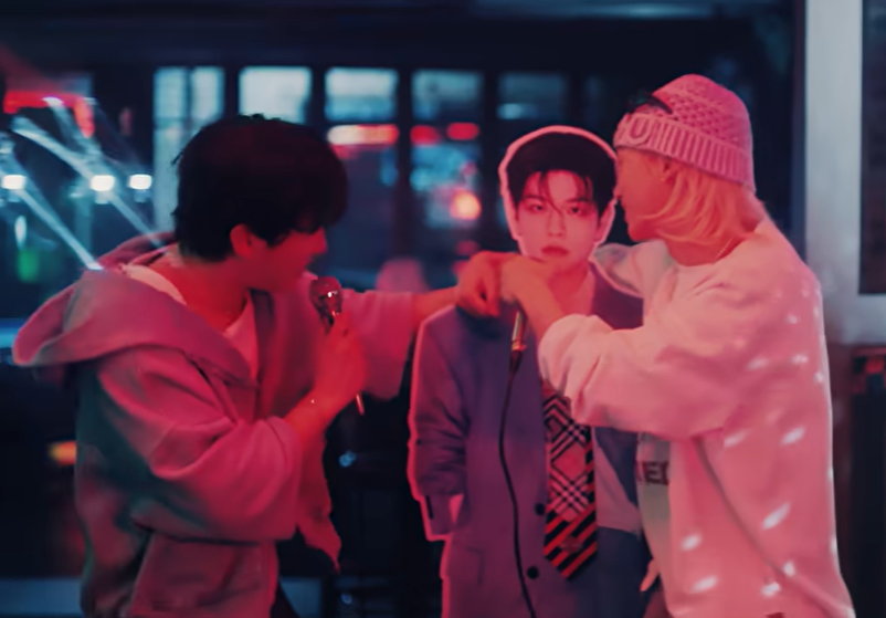Changbin and Felix singing with Seungmin cutout in "After You" music video.